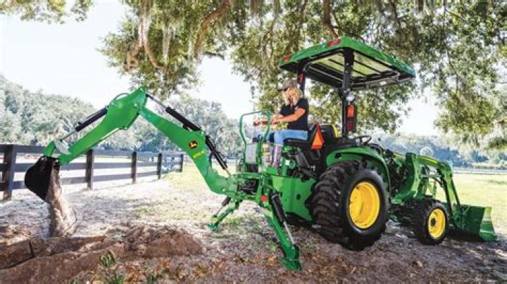 How much does a 300 John Deere backhoe weight?