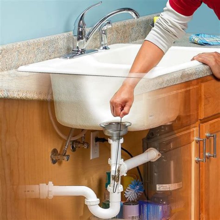 What is the best way to unclog a kitchen sink drain?